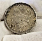 1891 O US Morgan Silver Dollar $1 XF (Rim Damage)