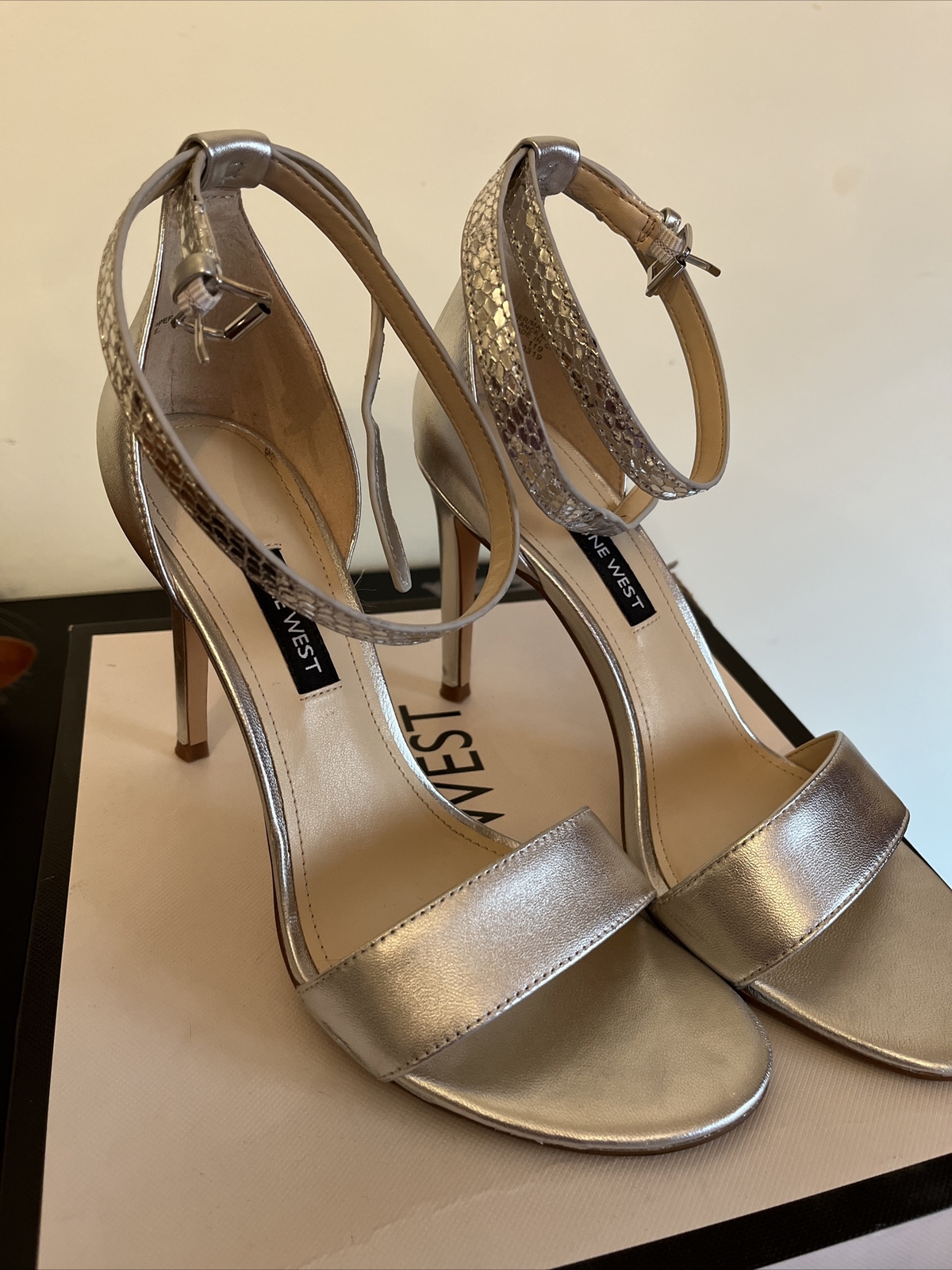 Nine West women's Nika silver Heeled Sandals Ankle Strap