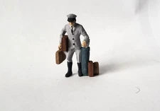 Arttista #1357 - Chauffer with Bags - O Scale Figure - Model Trains - NEW