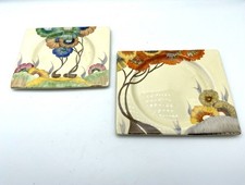 Clarice Cliff "Rhodanthe" pattern plates in the distinctive square "Biarritz"