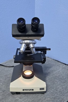 Olympus CH-2, CHT Microscope with objectives  4 X 10X 40X 100X   (INV10)