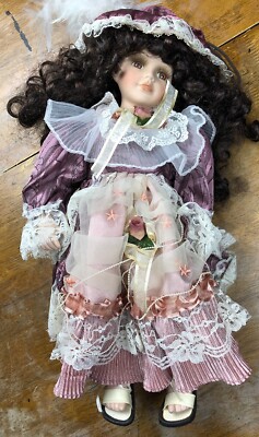 porcelain doll on swing