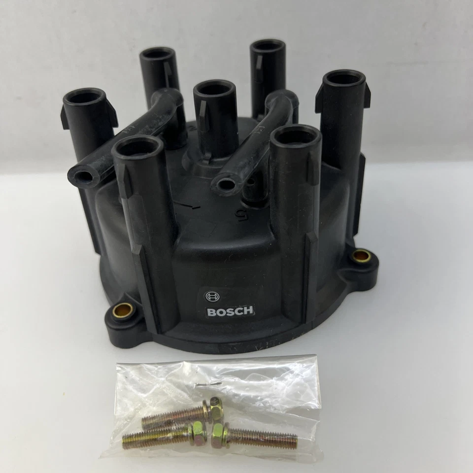 Tapa de distribuidor Bosch - 03384 con pernos para Toyota Camry y Lexus ES300 Foto 2 de 4