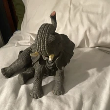 Gray Resin Elephant Figurine with Raised Trunk Decorative Collectible