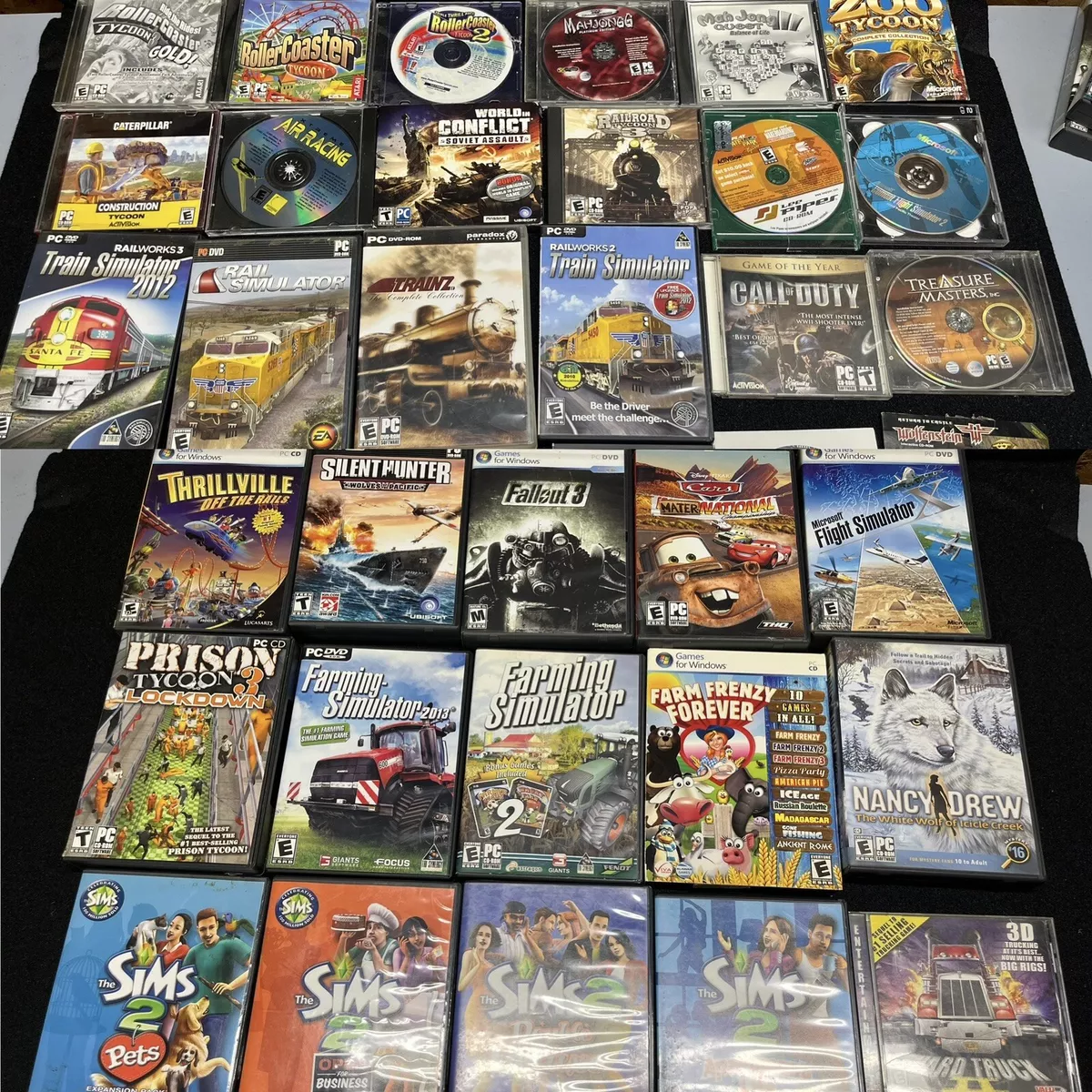 Lot of 39 CD-ROM PC Games Sims, Flight Simulator, Ghost Recon, Train  Tycoon….