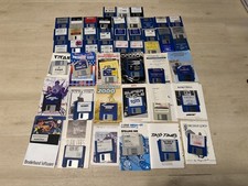 Assortment of Atari ST Discs and Instructions. Untested image