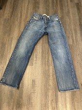 Vintage DIESEL INDUSTRIES blue mens jeans Size 31 100 cotton distressed denim
