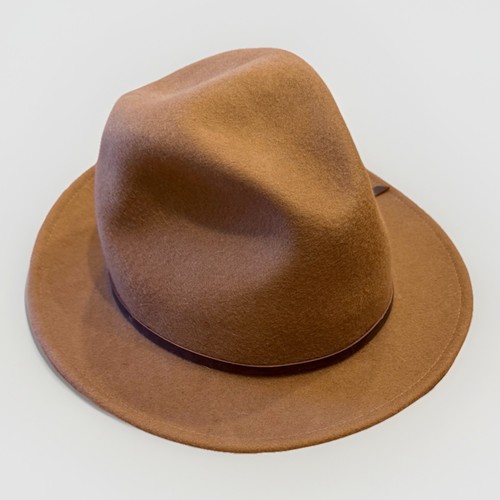 Tan and beige 100% wool fedora hat with pinched crown and wide brim, marked “Yellow” in size large.