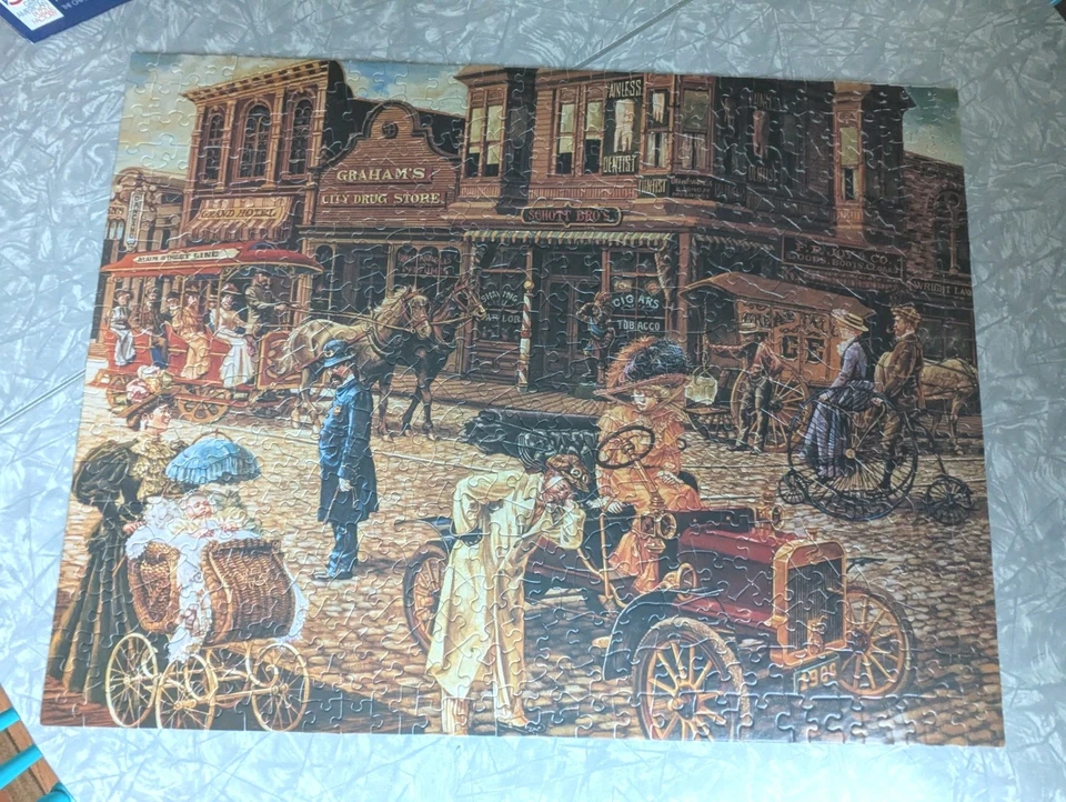 Great American Puzzle Factory 550 Piece Jigsaw Puzzle Main Street USA Lee Dubin - image 2 of 4