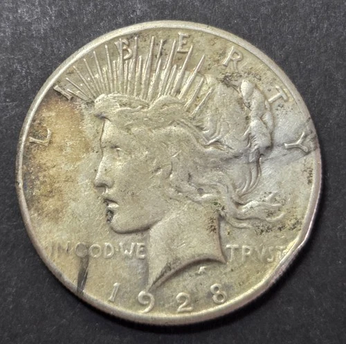 1928 Peace Dollar, VG, Rim Nick