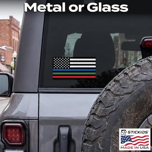 Thin blue American flag sticker with white and red stripes and a red border, made in USA, on a black SUV side window.