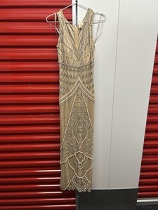 Wedding Dress Event In The Color Beige With Hand Made Design