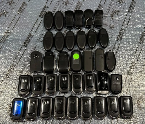 OEM-LOT OF 36 HONDA, NESSAN, , SUBARU, MAZDA, ACURA, INFINITI SMART REMOTES KEYS image 2