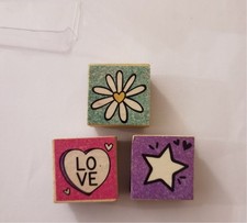 Three small rubber stamps, cartoon flower, star & love heart.