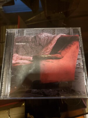 ANTIGAMA CD TITLED DISCOMFORT 12 SONGS OF NOISECORE ON EXTREMIST RECORDS