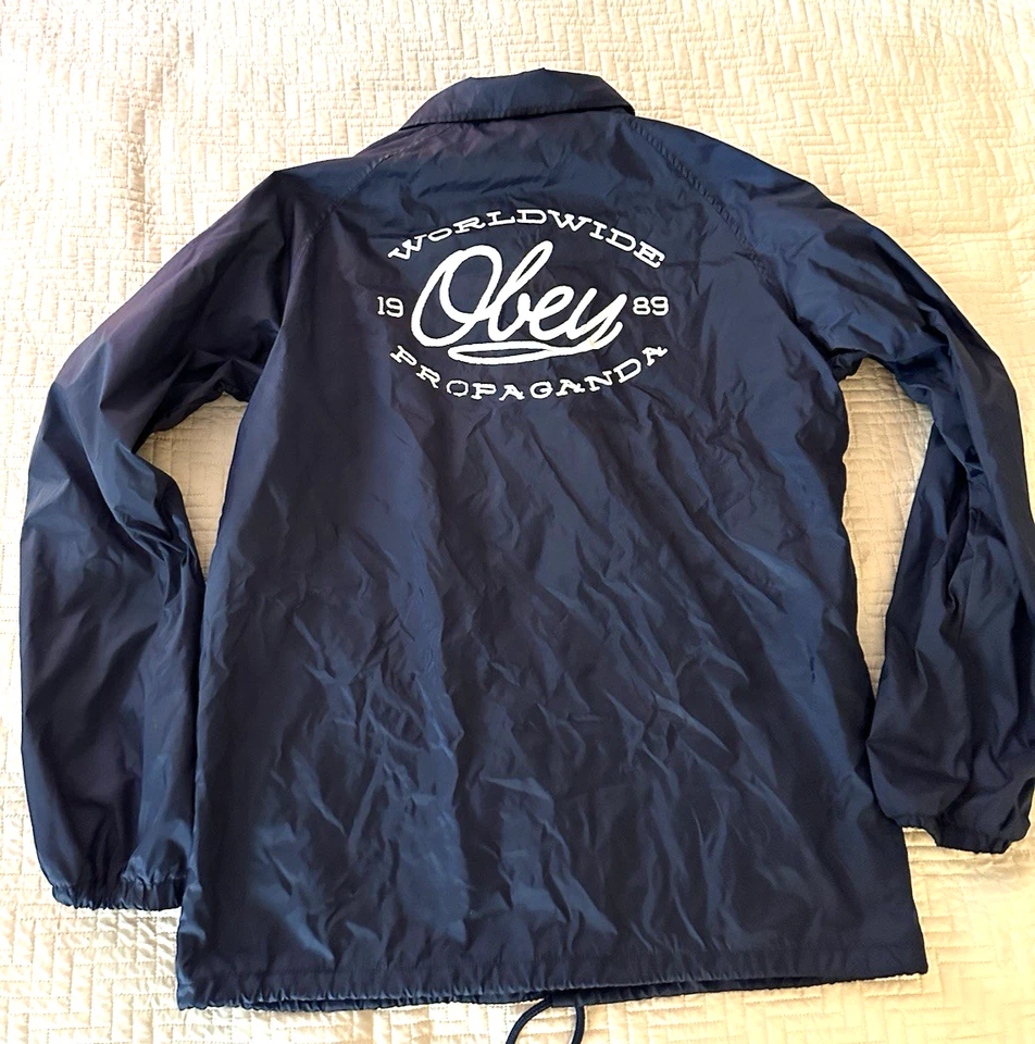 Chaqueta cortavientos azul Obey botón a presión talla grande 100 % nailon patinador callejero Foto 2 de 4