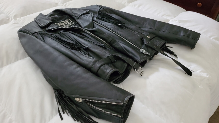 First genuine leather Woman's Size 12 biker jacket with tassels, Harley