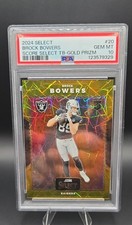 2024 Panini Select - Score Select Throwback Brock Bowers #20 Gold Prizm /10 (RC)