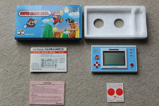 Thumbnail of ebay&reg; auction 166963253302 | VERPACKTES NINTENDO GAME & WATCH SUPER MARIO BROS YM-105 1988 TOP ZUSTAND