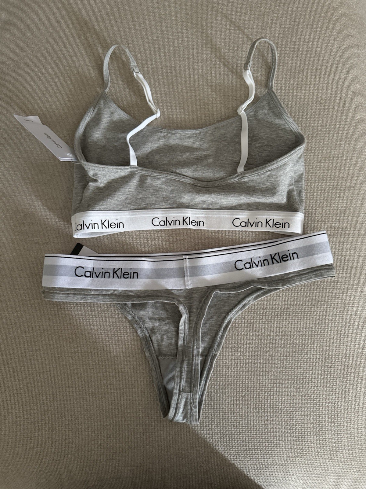 Brand New with tags-Calvin Klein Bralette Size M (looks S)- Thong size S-Gray
