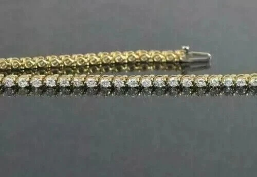 Brazalete tenis moissanita blanca de corte redondo de 6 quilates para mujer enchapado en oro amarillo de 14 quilates Foto 2 de 2