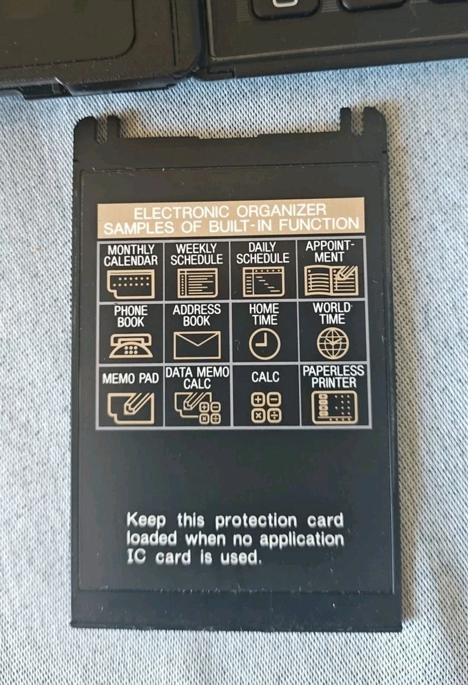 Calculadora organizadora electrónica Sharp OZ-7000 WIZARD de colección - sin probar Foto 3 de 4