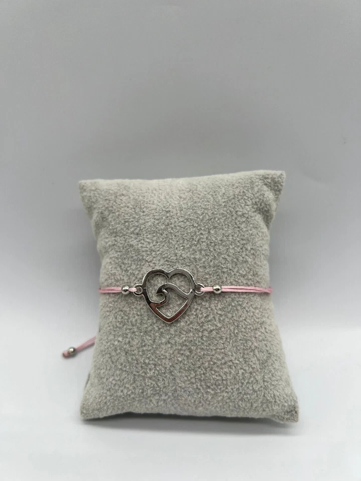Pulsera ajustable enchapada en plata con cuerda rosa amuleto onda en corazón paquete de 12 Foto 2 de 4
