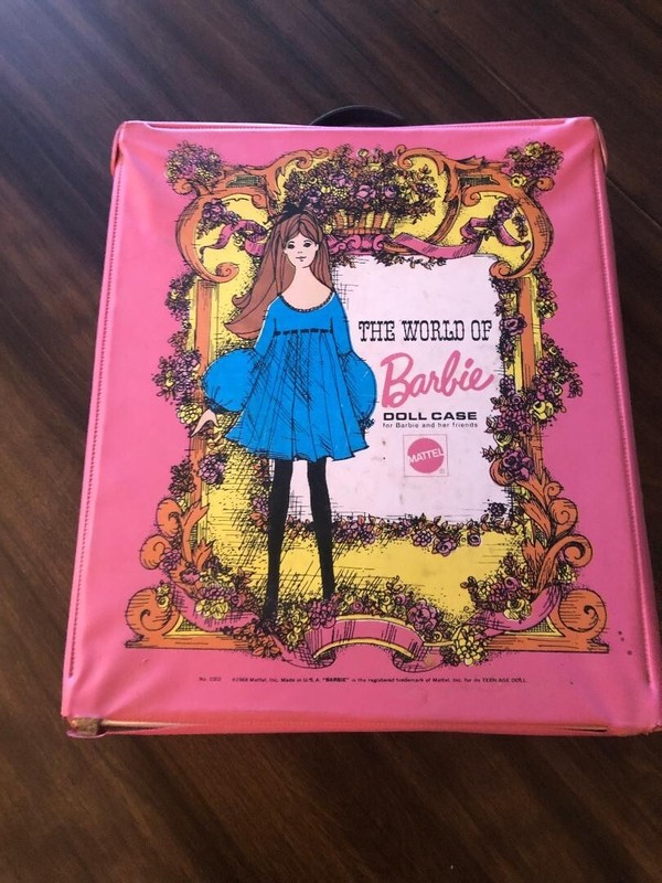 Vintage "The World of Barbie" Doll Case with 2 Barbie dolls and several outfits