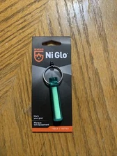 Ni-Glo Solar Gear Marker Dragon Green Recharges By Sun or Light Source Keychain