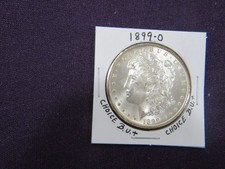 1899-O Morgan dollar in choice B.U. + condition