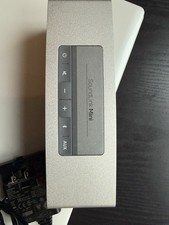 Bose Sound Link Mini Comes with The Charging Base and AC Charger