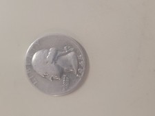 error coins 1945 quarter. No mint , outer rim cutes off the top of all the lette