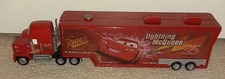 Disney Pixar Cars Lightning McQueen 95 Mack Superliner Semi Truck Hauler Playset