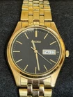 Seiko Men's Vintage Watch Day/Date Steel, Black Dial Gold Bracelet, 7N43-9048 A4