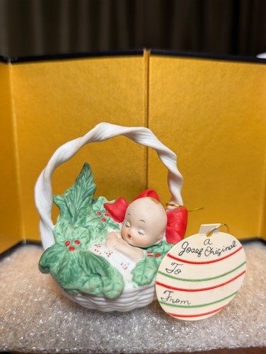 Josef Origional Christmas Ceramic Ornament Baby in Basket Mistletoe Ribbon