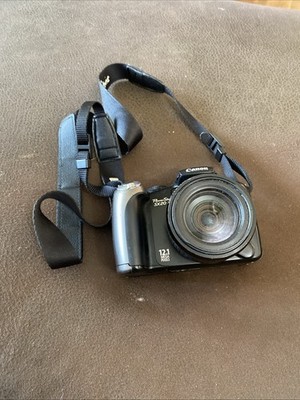Canon PowerShot SX20 IS 12.1MP Digital Bridge Camera 20x Optical Zoom
