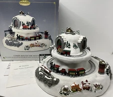 Mr. Christmas Comin' Round the Mountain Animated Train Plays 25 Songs See Video