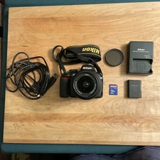 Nikon D3100 DSLR Camera + AF-S DX 18-55mm f/3.5-5.6G VR Lens Kit w/ Battery Char