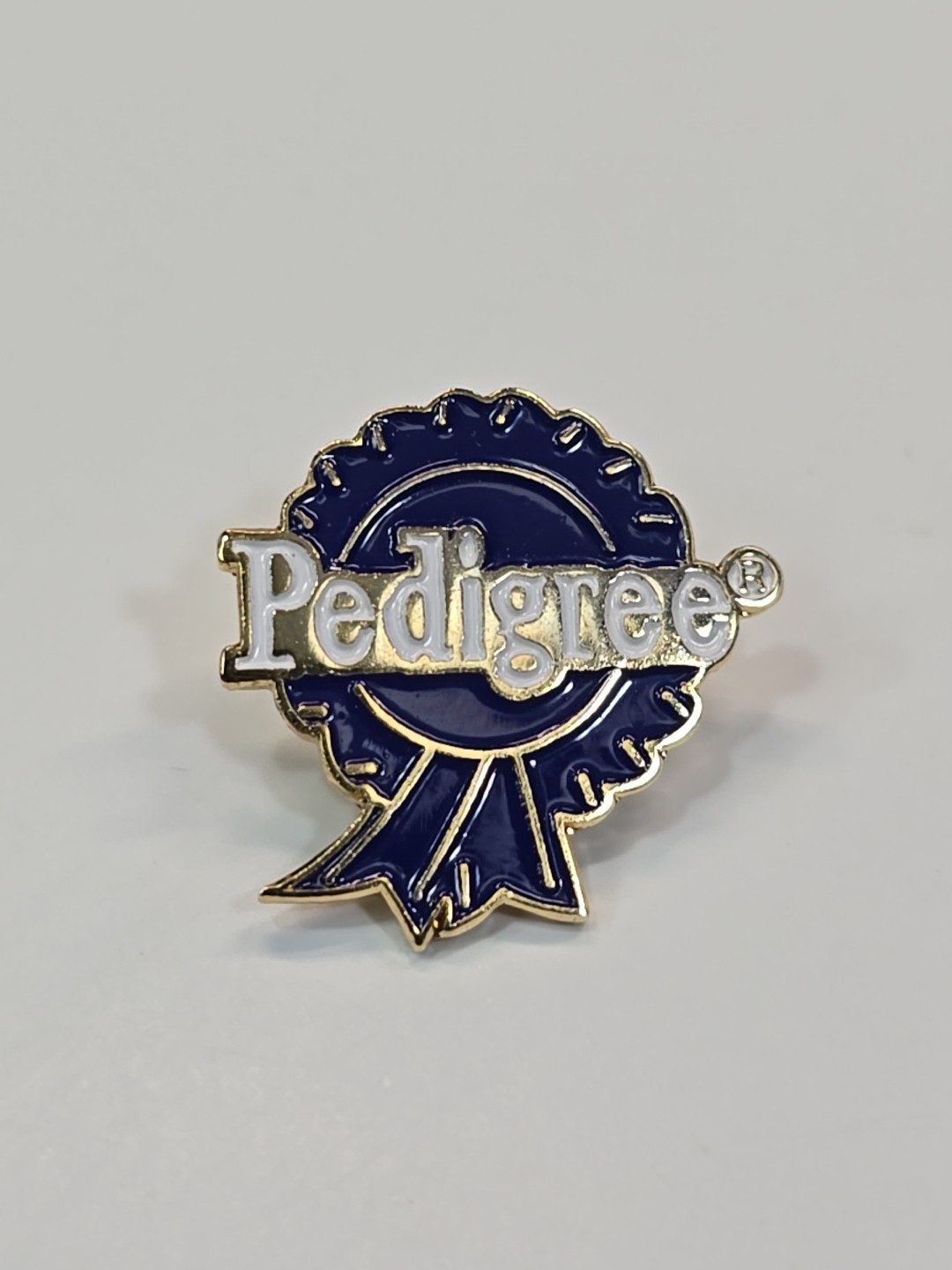 S Logo Lapel Pin Dog Food Blue Rosette