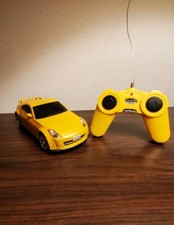 Yellow automatic rc car with remote control