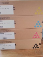 Image of Ricoh print cartridges (black, yellow, magenta, cyan)