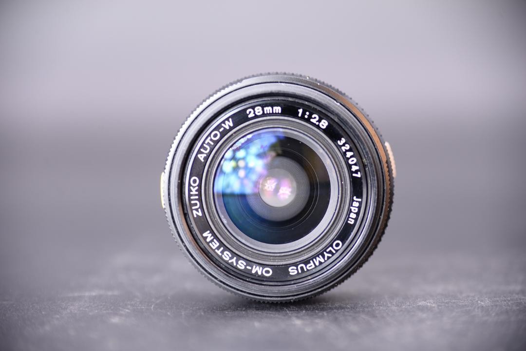 OLYMPUS OM Zuiko Auto-W 28mm f2.8 Lens with Minor Wear and