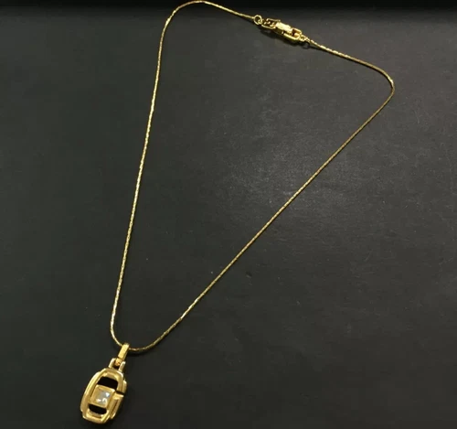 Collana con ciondolo GIVENCHY G logo strass tono oro 15"