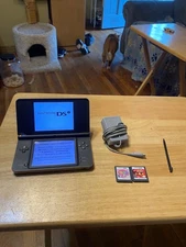Bronze Nintendo DSi XL Handheld Console with extras