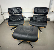 Paar Charles und Ray Eames Lounge Chair mit Ottoman 1990er Hermann Miller Sessel