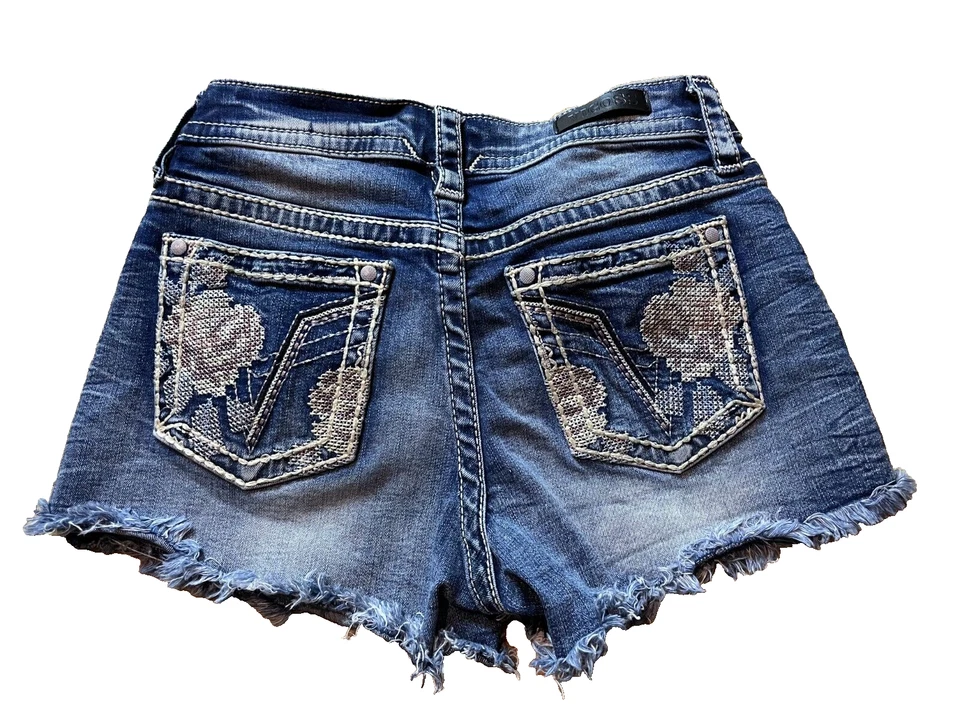 Mini Pantalones Cortos de Denim Elásticos Vigoss Cortos Floral Bordado 6 x 2.5" Foto 2 de 4