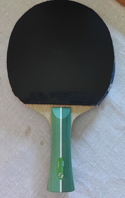 Stiga Aura Hybrid Carbon paddle-flared handle with rubber sheets