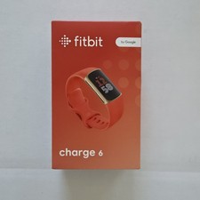 fitbit - Charge 6 - Fitness Tracker - Champagne Gold Case Coral Band