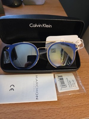 Round Platinum Blue Women's Sunglasses by Calvin Klein, 50 mm