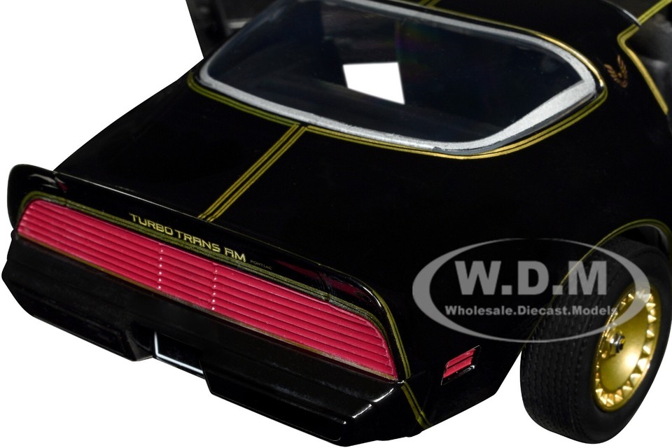 1980 Pontiac Firebird Trans Am T/A Turbo 4.9L Starlite Black with Golden Eagle Hood and Stripes 1/24 Diecast Model Car by Greenlight
